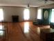 Bright living room boasts a fireplace, hardwood floors and lots of natural light from the large windows at 4744 Chickasaw Se Way, Acworth, GA 30102