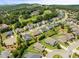 Community aerial view showcasing the beautiful homes and lush landscaping of the neighborhood at 508 Windy Ridge Ct, Canton, GA 30114