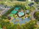 Aerial view of the community amenities including pool, tennis courts, playgrounds, and a clubhouse at 508 Windy Ridge Ct, Canton, GA 30114