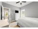 Cozy bedroom featuring neutral walls and a ceiling fan at 508 Windy Ridge Ct, Canton, GA 30114