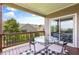 Outdoor deck features a table and chairs, as well as convenient access to the home interior at 508 Windy Ridge Ct, Canton, GA 30114