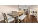 Open-concept home features a dining area adjacent to the kitchen and living room at 508 Windy Ridge Ct, Canton, GA 30114