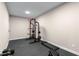 Home gym with full weight set at 508 Windy Ridge Ct, Canton, GA 30114