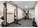 Home gym with full weight set at 508 Windy Ridge Ct, Canton, GA 30114