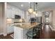 Gourmet kitchen featuring a large island with pendant lighting and barstool seating at 508 Windy Ridge Ct, Canton, GA 30114