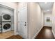 Convenient laundry area with tile flooring, washer, and dryer at 508 Windy Ridge Ct, Canton, GA 30114