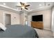 Bright main bedroom with a ceiling fan and large windows at 508 Windy Ridge Ct, Canton, GA 30114