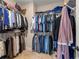 Spacious walk-in closet with ample shelving and hanging space at 508 Windy Ridge Ct, Canton, GA 30114