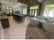 Bright amenity area with seating and kitchen, perfect for entertaining and relaxing with neutral colors and big windows at 1117 Cordia Ave, Atlanta, GA 30318