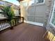 Spacious wood deck offers an inviting outdoor space with neighborhood views and a spot for potted plants at 1117 Cordia Ave, Atlanta, GA 30318