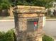 Stone entrance gate for visitor access to the Enclave on Collier community at 1117 Cordia Ave, Atlanta, GA 30318