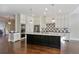 Well-appointed kitchen with a large center island, stainless appliances, and custom cabinetry at 1117 Cordia Ave, Atlanta, GA 30318