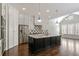 Modern kitchen featuring a large island, stainless steel appliances, and ample cabinet space at 1117 Cordia Ave, Atlanta, GA 30318