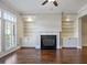 Spacious living room featuring fireplace, custom built-ins and abundant natural light at 1117 Cordia Ave, Atlanta, GA 30318