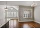Bright living space with hardwood floors, large windows, and custom plantation shutters at 1117 Cordia Ave, Atlanta, GA 30318