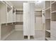 Spacious walk-in closet with custom shelving and ample storage, perfect for organization at 1117 Cordia Ave, Atlanta, GA 30318