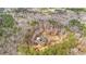 Ariel view of house showcasing lot and mature landscaping at 1452 Redwine Rd, Fayetteville, GA 30215