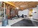 Unfinished basement area featuring workout equipment for fitness enthusiasts at 1452 Redwine Rd, Fayetteville, GA 30215