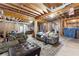 Spacious unfinished basement with seating area and exposed ceiling at 1452 Redwine Rd, Fayetteville, GA 30215