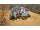 Rear exterior elevation of home, including deck at 1452 Redwine Rd, Fayetteville, GA 30215