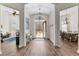 Grand foyer with hardwood flooring leading to adjacent dining and living spaces at 1452 Redwine Rd, Fayetteville, GA 30215