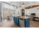 Spacious kitchen with a large island, stainless steel appliances, and adjacent eating area at 1452 Redwine Rd, Fayetteville, GA 30215
