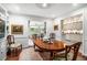 Elegant dining room featuring hardwood floors, classic furniture, and an open layout for seamless entertaining at 170 Elysian Nw Way, Atlanta, GA 30327