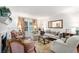 Bright living room boasting a fireplace, large window, and comfortable seating, perfect for relaxation at 170 Elysian Nw Way, Atlanta, GA 30327