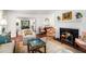 Comfortable living room with hardwood floors, fireplace, and classic furniture, creating an inviting ambiance at 170 Elysian Nw Way, Atlanta, GA 30327