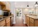Well-appointed kitchen with granite counters, stainless appliances, and a view of the balcony at 2230 Cheshire Bridge Ne Rd # 401, Atlanta, GA 30324