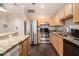 Well-equipped kitchen with stainless steel appliances, granite countertops, and ample cabinet space at 2230 Cheshire Bridge Ne Rd # 401, Atlanta, GA 30324