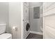 Compact laundry area featuring a stacked washer and dryer for efficient space saving at 2230 Cheshire Bridge Ne Rd # 401, Atlanta, GA 30324