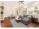Inviting living room with hardwood floors, modern furnishings, and abundant natural light at 2230 Cheshire Bridge Ne Rd # 401, Atlanta, GA 30324