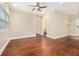 Bright, spacious living room with hardwood floors, ceiling fan, and ample natural light at 2230 Cheshire Bridge Ne Rd # 401, Atlanta, GA 30324