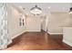 Open-concept living space showcasing stylish hardwood flooring, and direct access to the kitchen at 2230 Cheshire Bridge Ne Rd # 401, Atlanta, GA 30324