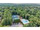 A lush, green, aerial shot of the neighborhood's tennis courts and beautiful community pool at 2855 Lamer Trce, Marietta, GA 30066