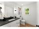 Modern bathroom with a sleek vanity, stylish mirror, and contemporary lighting at 2855 Lamer Trce, Marietta, GA 30066