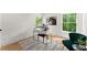 Cozy home office with natural light, hardwood floors, and a comfortable chair at 2855 Lamer Trce, Marietta, GA 30066