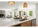 Bright open-concept kitchen with island sink and views to the living and breakfast nook at 2855 Lamer Trce, Marietta, GA 30066