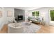 Cozy living room with fireplace, hardwood floors, and neutral-toned furnishings at 2855 Lamer Trce, Marietta, GA 30066