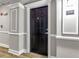 A front view of unit 2118 and the hallway featuring painted columns at 1850 Cotillion Drive # 2118, Dunwoody, GA 30338