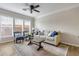 Cozy living room with ample natural light, comfortable seating, and stylish decor at 1850 Cotillion Drive # 2118, Dunwoody, GA 30338