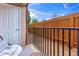 Outdoor patio with furniture and black metal railing, offering a private relaxation space at 1850 Cotillion Drive # 2118, Dunwoody, GA 30338