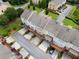 Aerial view of townhome community featuring decks and parking, providing a blend of outdoor living and convenience at 2367 Millhaven Se St, Smyrna, GA 30080