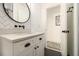 Modern bathroom features a sleek vanity with matte black hardware at 3135 Bluebird Ln, Decatur, GA 30032