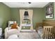 Bedroom boasts ample natural light, cozy furnishings and modern design at 3135 Bluebird Ln, Decatur, GA 30032