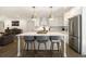 Bright, stylish kitchen featuring a large island, stainless steel appliances, and sleek countertops at 3135 Bluebird Ln, Decatur, GA 30032