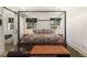 Beautifully designed main bedroom features modern decor, a tray ceiling and natural light at 3135 Bluebird Ln, Decatur, GA 30032