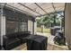 Cozy patio with outdoor seating, barbeque and a view of the backyard at 3135 Bluebird Ln, Decatur, GA 30032