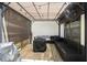 Covered patio with comfortable seating and a ceiling fan at 3135 Bluebird Ln, Decatur, GA 30032